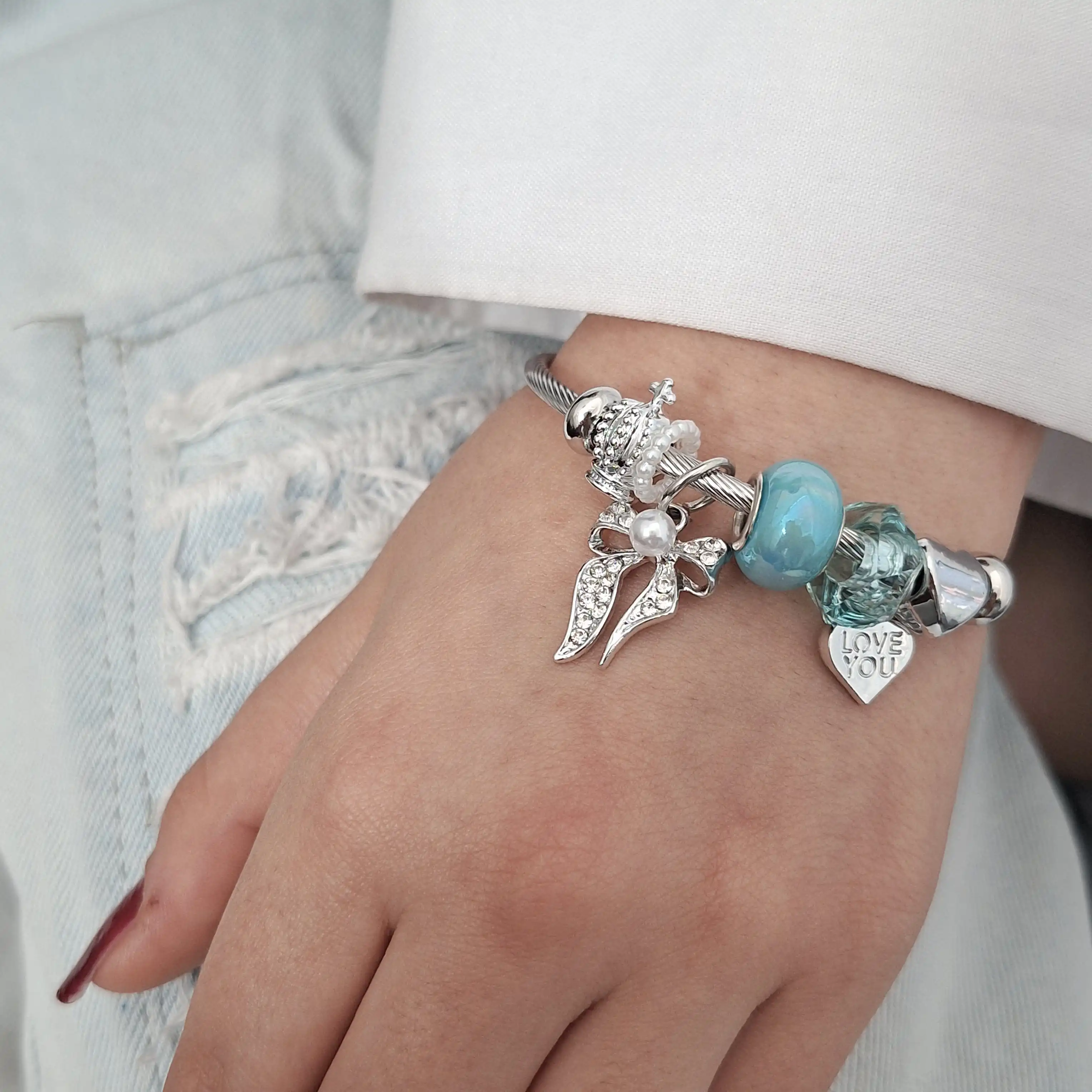 دستبند پاندورا طرح پاپیون مرواريدی آبی